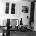 The appliances of the 1950's. Especially note the television, probably black and white.