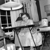 Ted Steinhauer at Cracker Box Manor, 1957. The "red table" she's sitting at is still in existence and plays its part in the development and maintenance of this website.